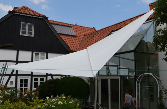 Hovestadt  Sonnensegel über Terrasse und Wintergarten